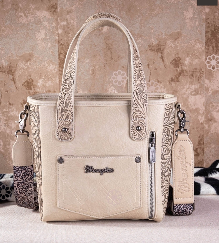 Concealed Carry Hair on Hide wrangler bag with additional strap. Fringe & Turquoise details