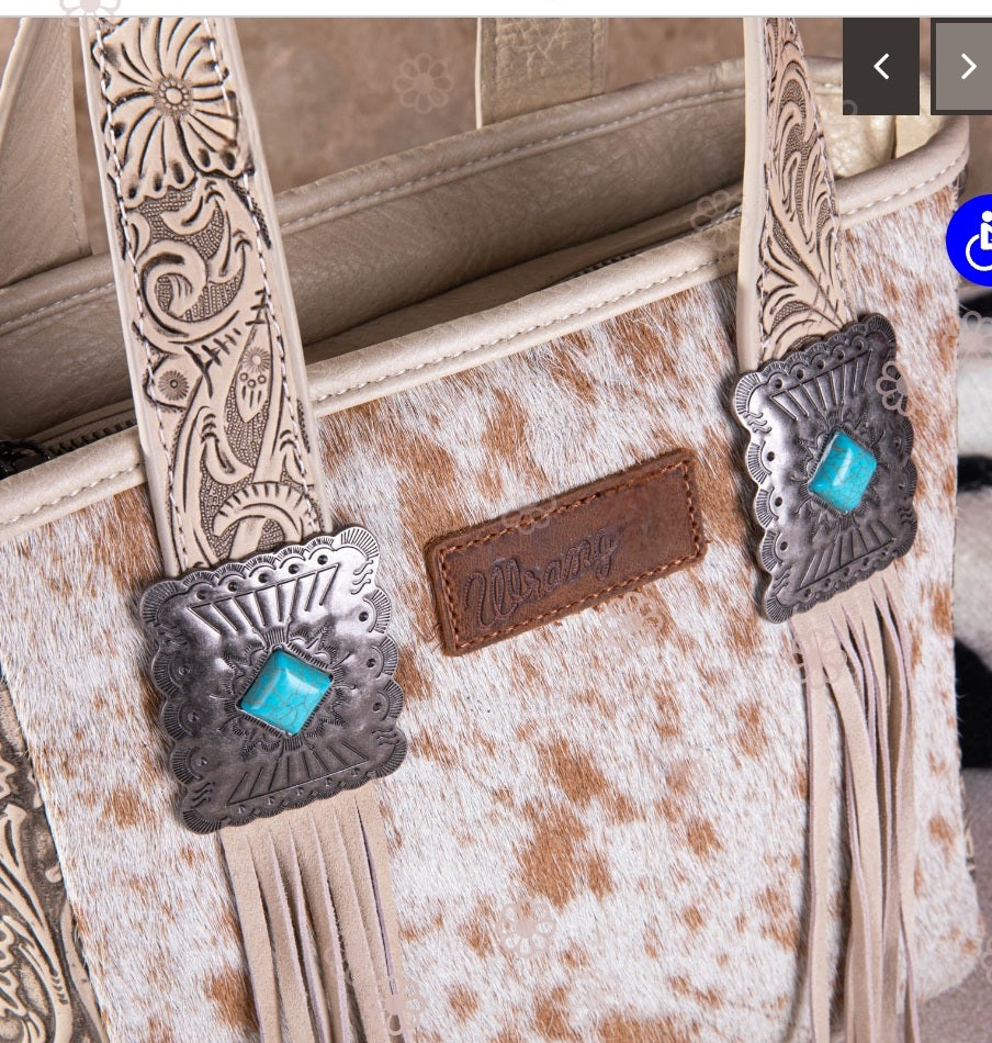 Concealed Carry Hair on Hide wrangler bag with additional strap. Fringe & Turquoise details